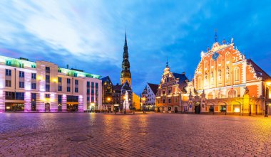 Evening scenery of the Old Town Hall Square in Riga, Latvia clipart
