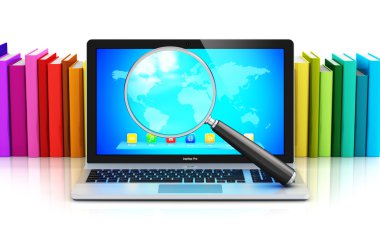 Laptop ve Büyüteç camı önünde satır rengi kitap