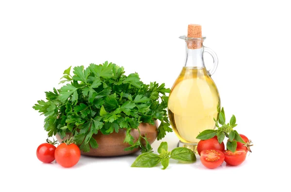 Petersilienblätter mit Olivenöl und Kirschtomaten — Stockfoto