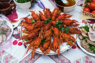 Boiled crayfish on a platter closeup