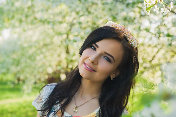 Young attractive smiling woman with beaded headband — Stock Photo, Image
