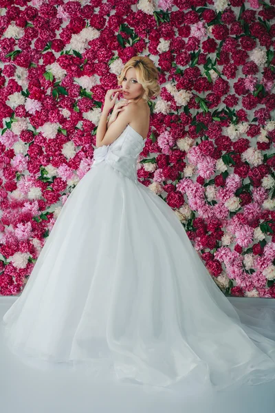 Bride on the peony background — Stock Photo, Image