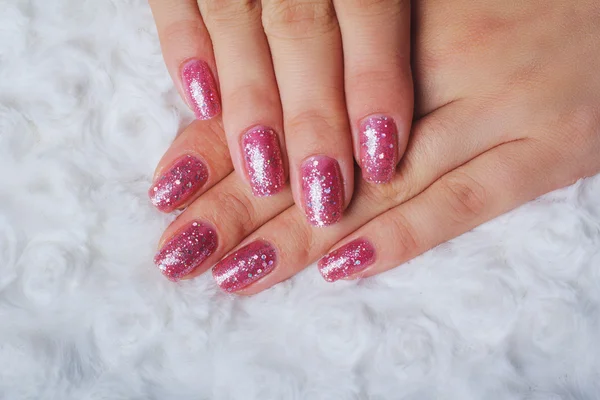 Light pink nail art with tinsel — Stock Photo, Image