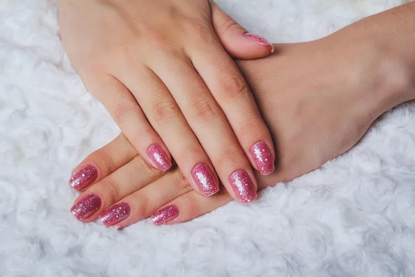 Light pink nail art with tinsel — Stock Photo, Image