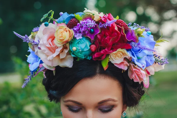 Young attractive woman with coronet of flowers — Stock Photo, Image