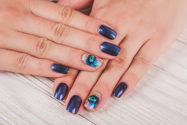 Dark blue nail art with print eye — Stock Photo, Image