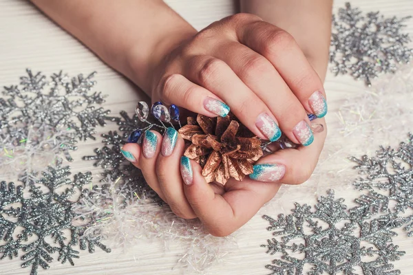 Winter nail art with snowflakes and light blue french — Stock Photo, Image