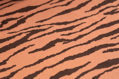 Arkaplan olarak desenli kahverengi kumaş dokusu.