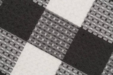 Arka plan olarak siyah ve beyaz mutfak havlusu dokusu, yatay resim.