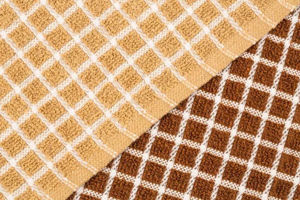 棕色和米黄色的毛巾以纹理为背景 — 图库照片