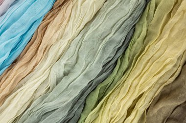 Arkaplan olarak renkli kumaş dokusu, yatay resim.