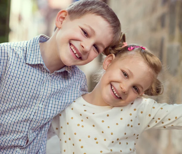 Portrait of two happy cute kids summer park — Stock Photo, Image