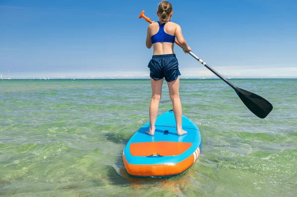 Cute Little Girl Ecercise Paddling Sup Board Sea Beautiful Sunny — Stock fotografie