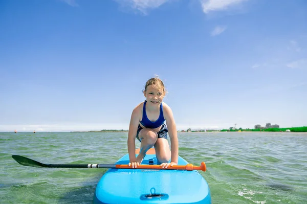 Cute Little Girl Exercise Stay Paddle Board Sea Sunny Summer — Stock Photo, Image