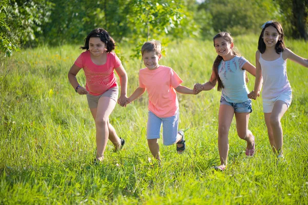 Group of happy children playing — Stock Photo, Image