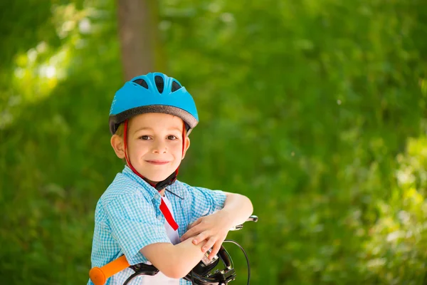 Cute little boy on bike — Stock Photo, Image