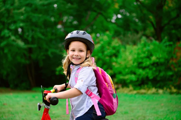 Pretty little girl ride with bicycle — Stock Photo, Image