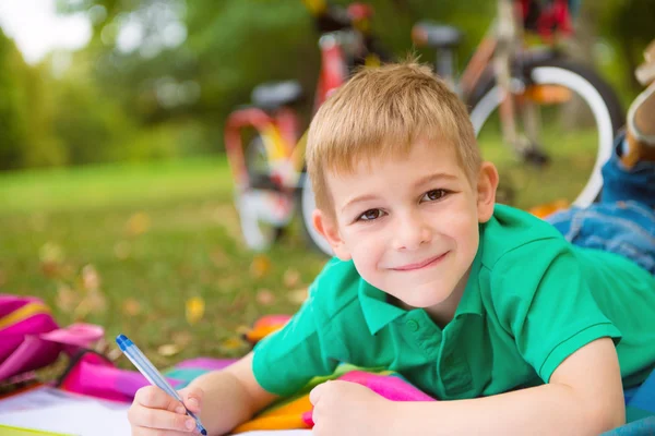 Portrait of cute boy in park — Stock Photo, Image