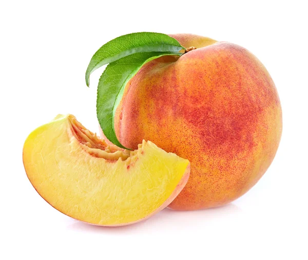 Peach and slices with leaves — Stock Photo, Image