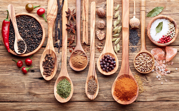 Spices on a wooden background