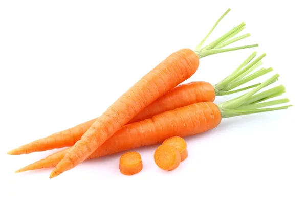 Young carrot with slice — Stock Photo, Image