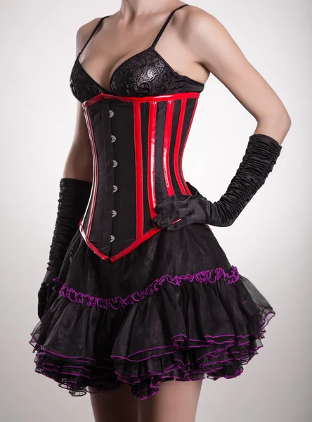 Beautiful woman in black and red corset Royalty Free Stock Images