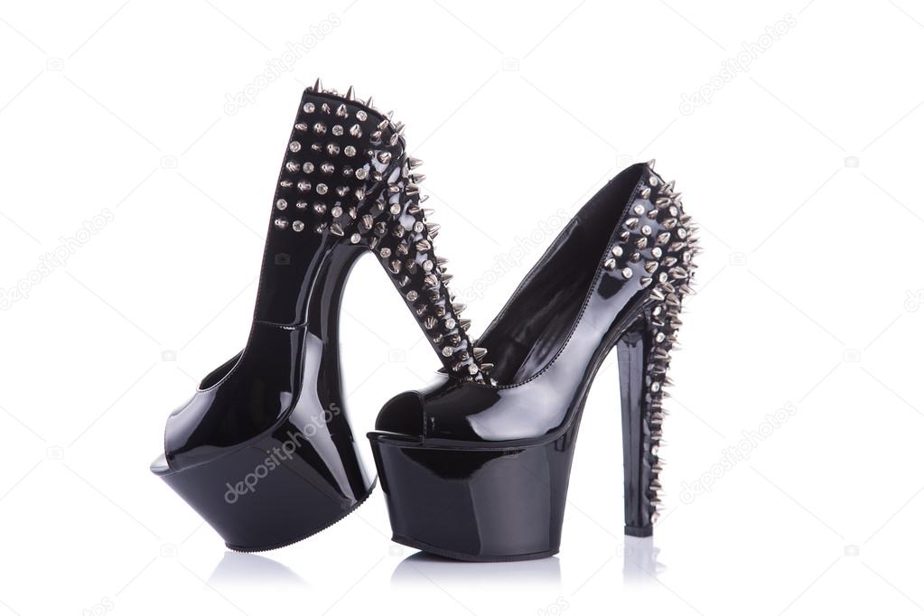 Black fashionable high heel shoes with spikes and studs 