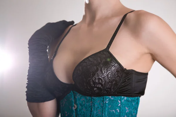 Donna in reggiseno e corsetto — Foto Stock