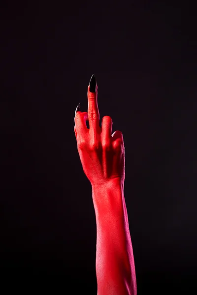 Diabo mão mostrando dedo médio — Fotografia de Stock