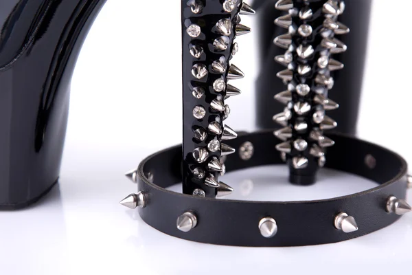 Black high heel shoes with spikes — Stock Photo, Image