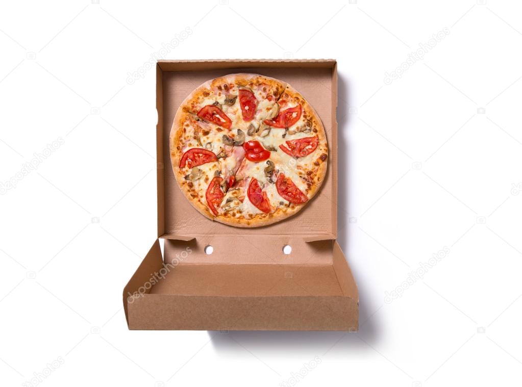 Italian pizza with ham and tomatoes in box