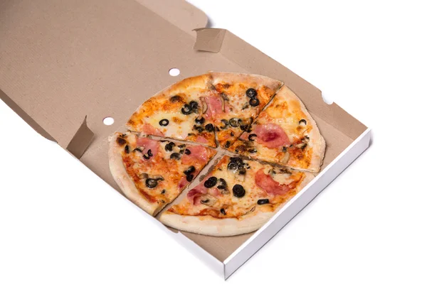 Pizza with ham and tomatoes in box — Stock Photo, Image