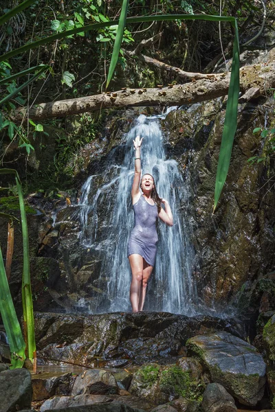 Beautiful girl showering in river under waterfall — Stock ... Beautiful girl showe