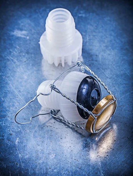 Plastic cork stoppers with twisted wire — Stock Photo, Image