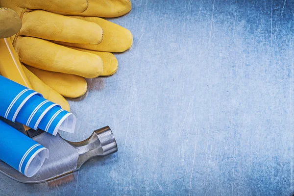 Protective gloves, blueprints — Stock Photo, Image