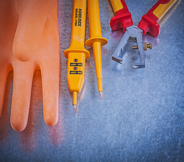 Insulating gloves, insulation strippers