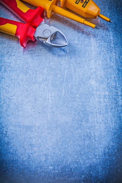 Yellow electrical tester and nippers — Stock Photo, Image