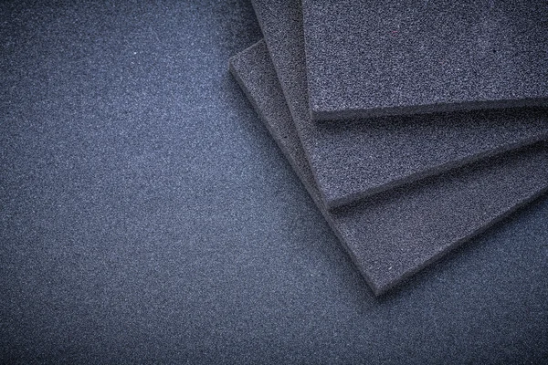Sanding sponges on emery paper — Stock Image Sanding sponges on emery paper Stock Photo