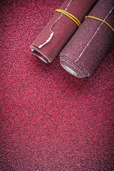 Rolled up emery papers — Stock Image Rolled up emery papers Royalty Free Stock Photos