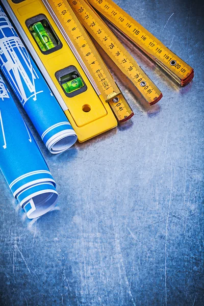 Houten meter, bouwplannen en niveau — Stockfoto