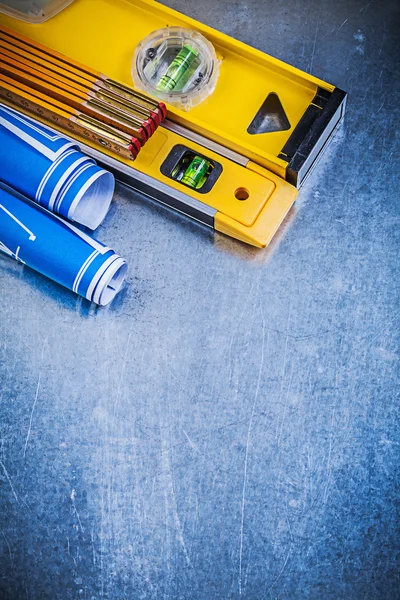 Construction plans, levels and wooden meter — Stock Photo, Image