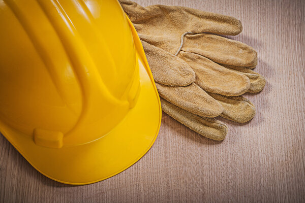 Leather safety gloves and hard hat 