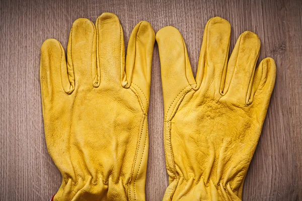 Leather yellow protective gloves — Stock Photo, Image