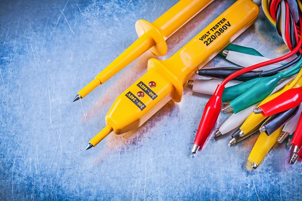 Yellow electrical tester and crocodile plugs — Stock Photo, Image