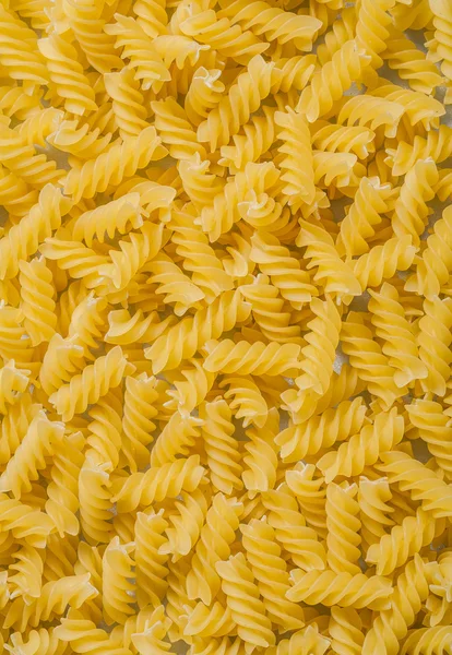 Spiral macaroni background — Stock Photo, Image