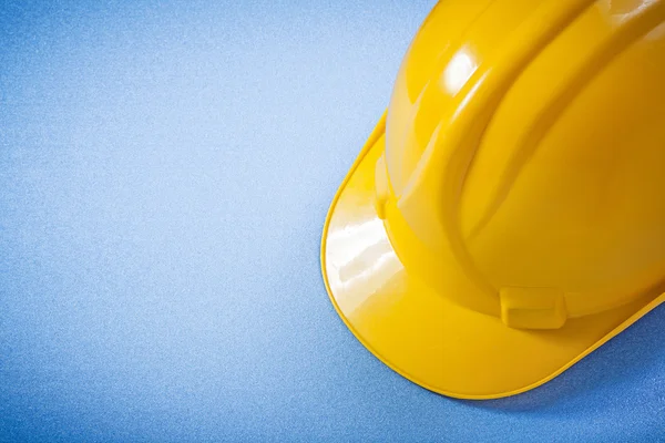 Capacete de construção em azul — Fotografia de Stock