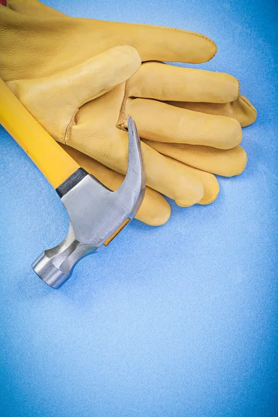 Claw hammer and leather protective gloves — Stock Photo, Image