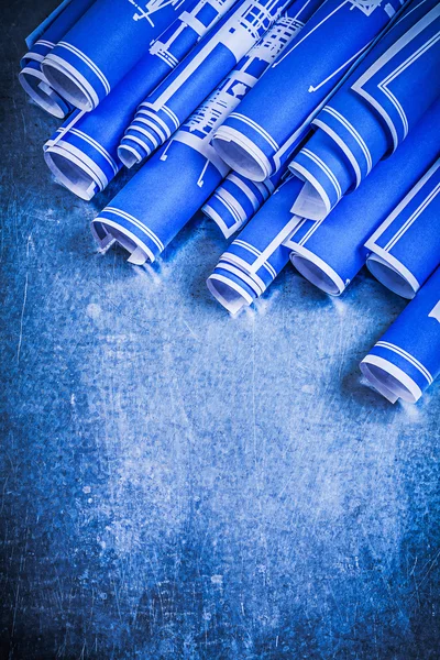Blauw opgerolde blauwdrukken — Stockfoto