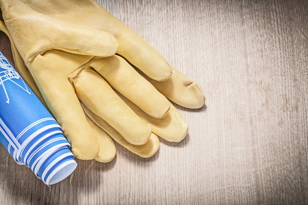 Rękawice ochronne i plany niebieski — Zdjęcie stockowe