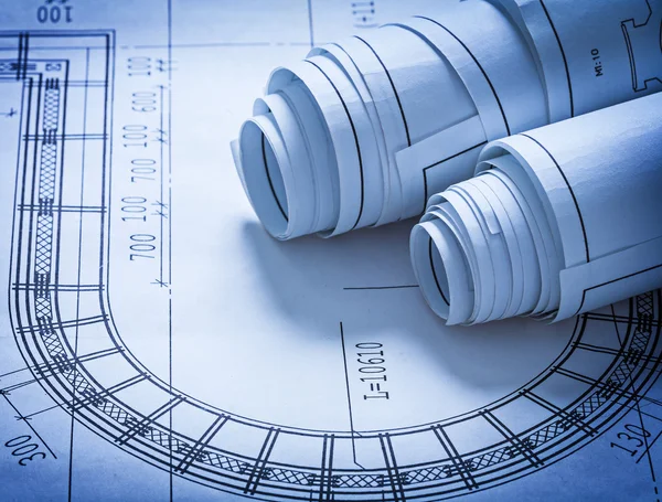 Rolled up construction blueprints — Stock Photo, Image